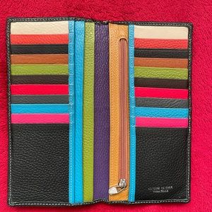 Black pebble leather slim wallet. Purchased in Italy.